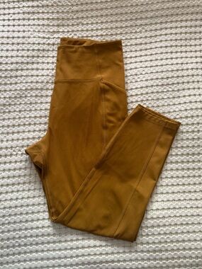 Girlfriend Collective high rise compression leggings in color saddle